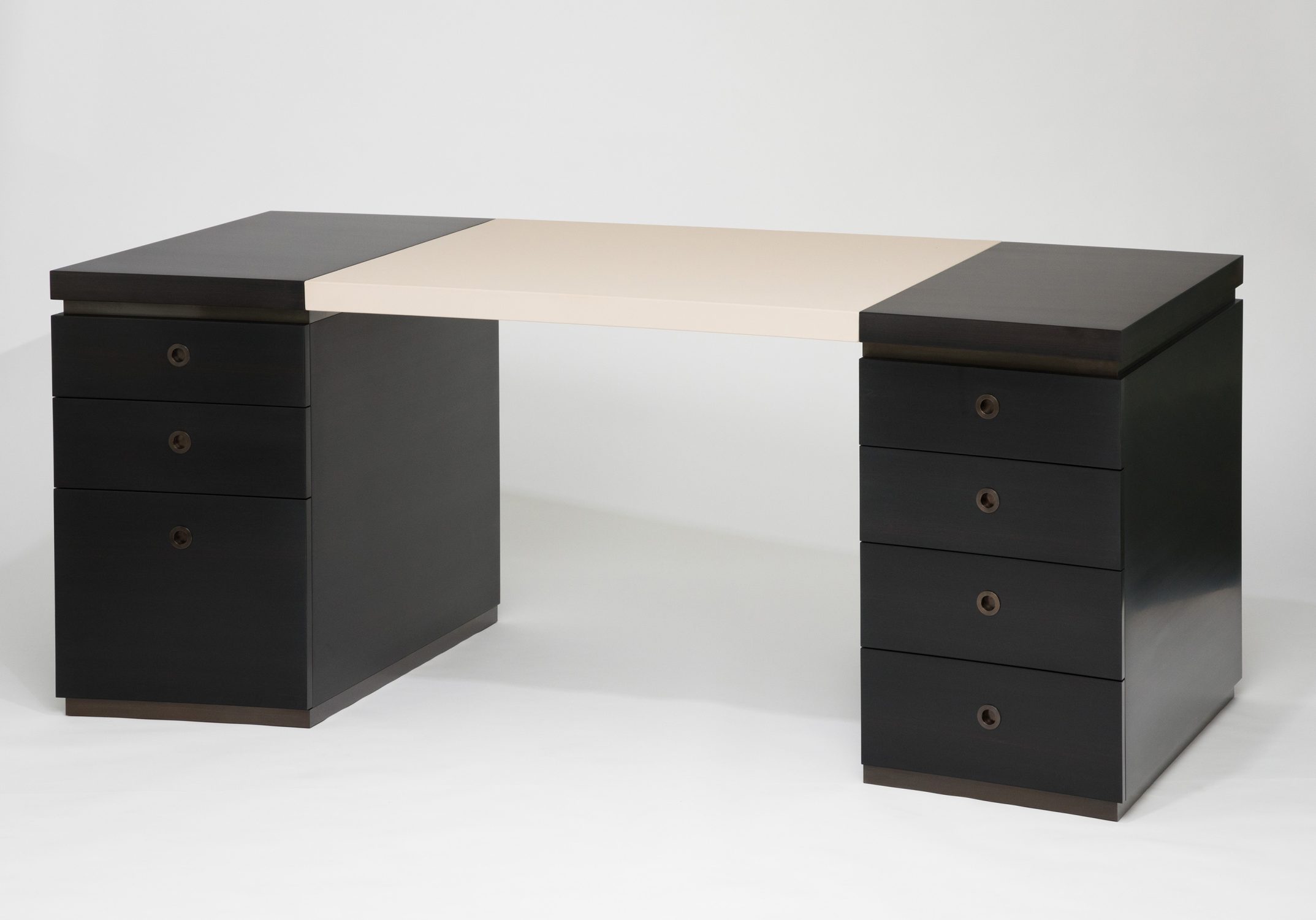 curved ebony and leather desk