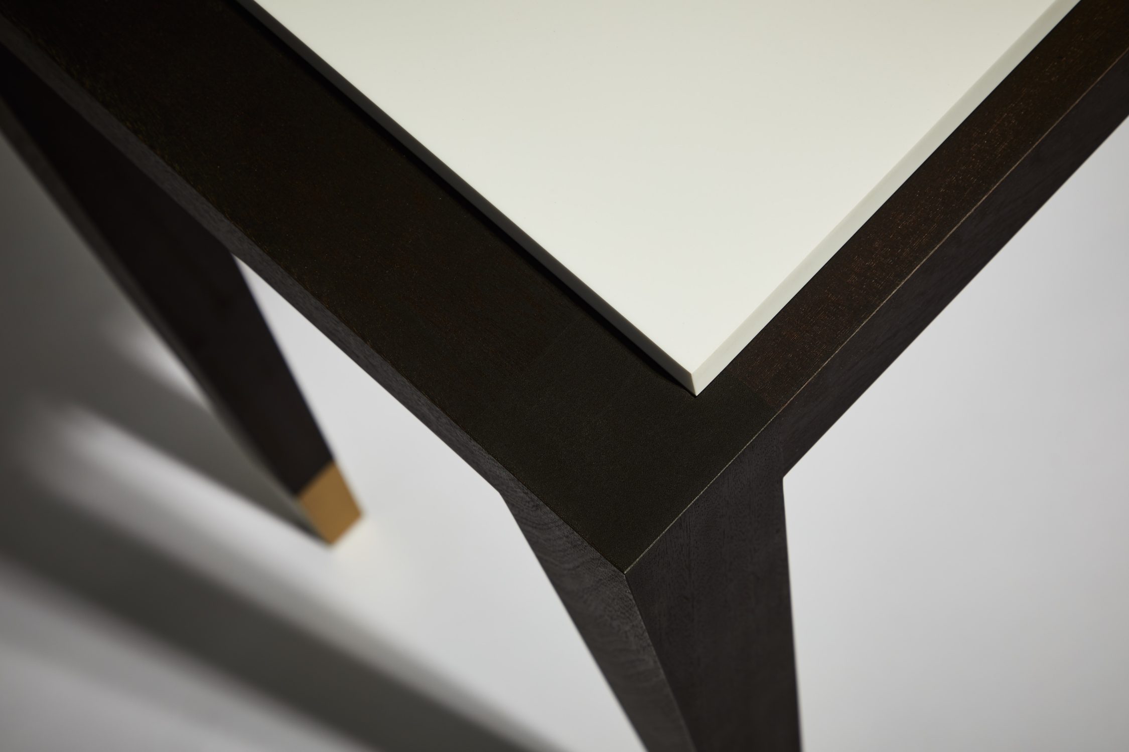 modern table walnut corian detail
